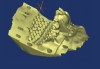 Fig 6. A 3D printed scaffold was designed using CAD software to fit a peri-osseous defect in a human patient. The scaffold consisted of a region with channels designed to support oriented PDL tissue formation and a region for the regeneration of osseous tissue. Fig 3: baseline; 
Fig 4: defect model; Fig 5 through Fig 7: internal, tilted, and side views of scaffold, respectively; Fig 8 through Fig 10: coronal, middle, and apical 
angles, respectively; Fig 11: cross-section diagram; Fig 12: labial scan image. (Images reprinted with permission from Rasperini G, Pilipchuk SP, Flanagan CL, et al. J Dent Res. 2015;94[9 suppl]:153S-157S.)